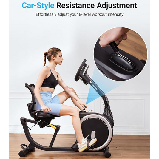 a woman sitting on a stationary exercise bike
